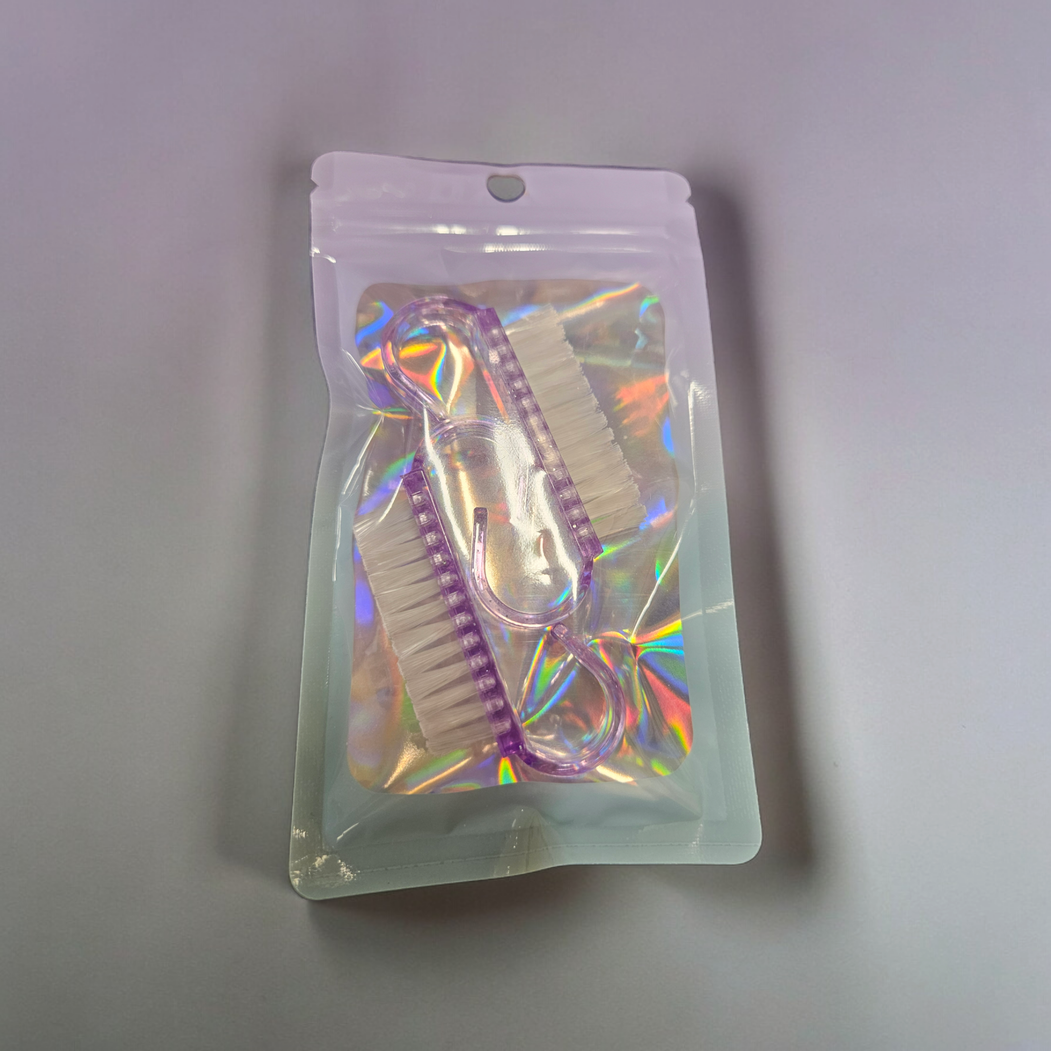 2 mini cepillos de uñas