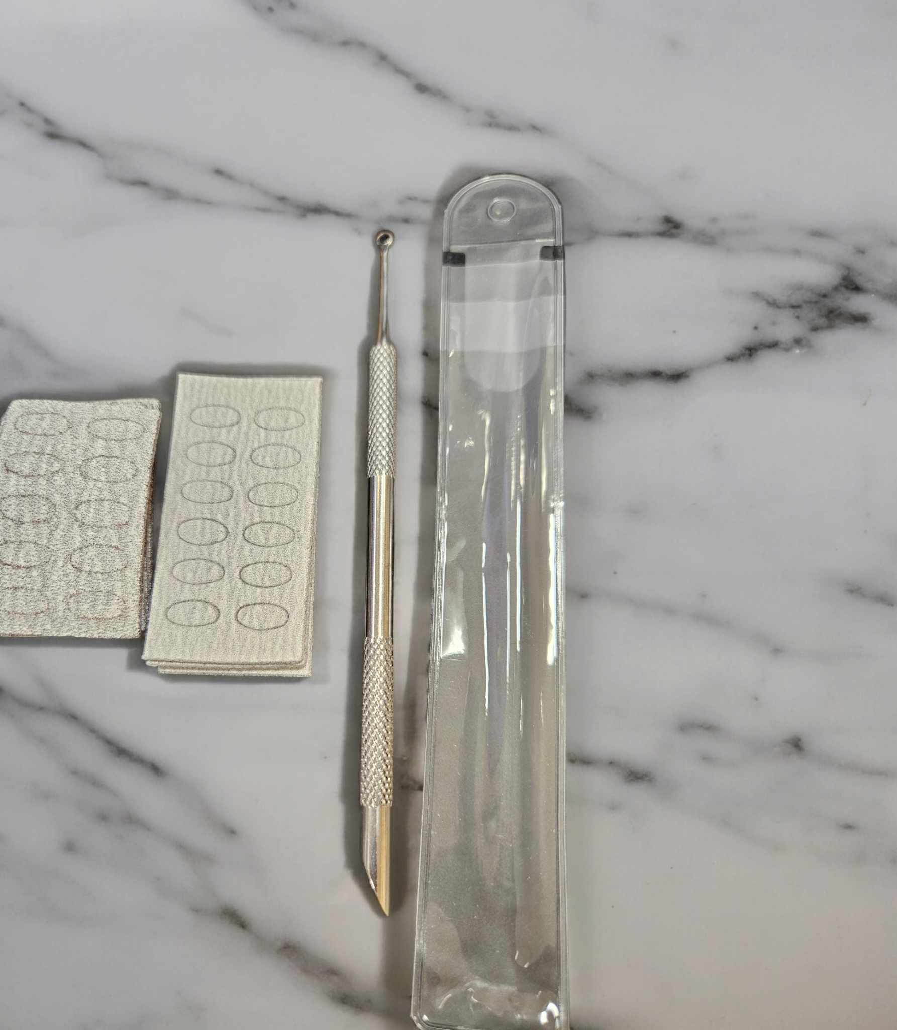 Dual ended cuticle remover and pusher. Slanted and loop