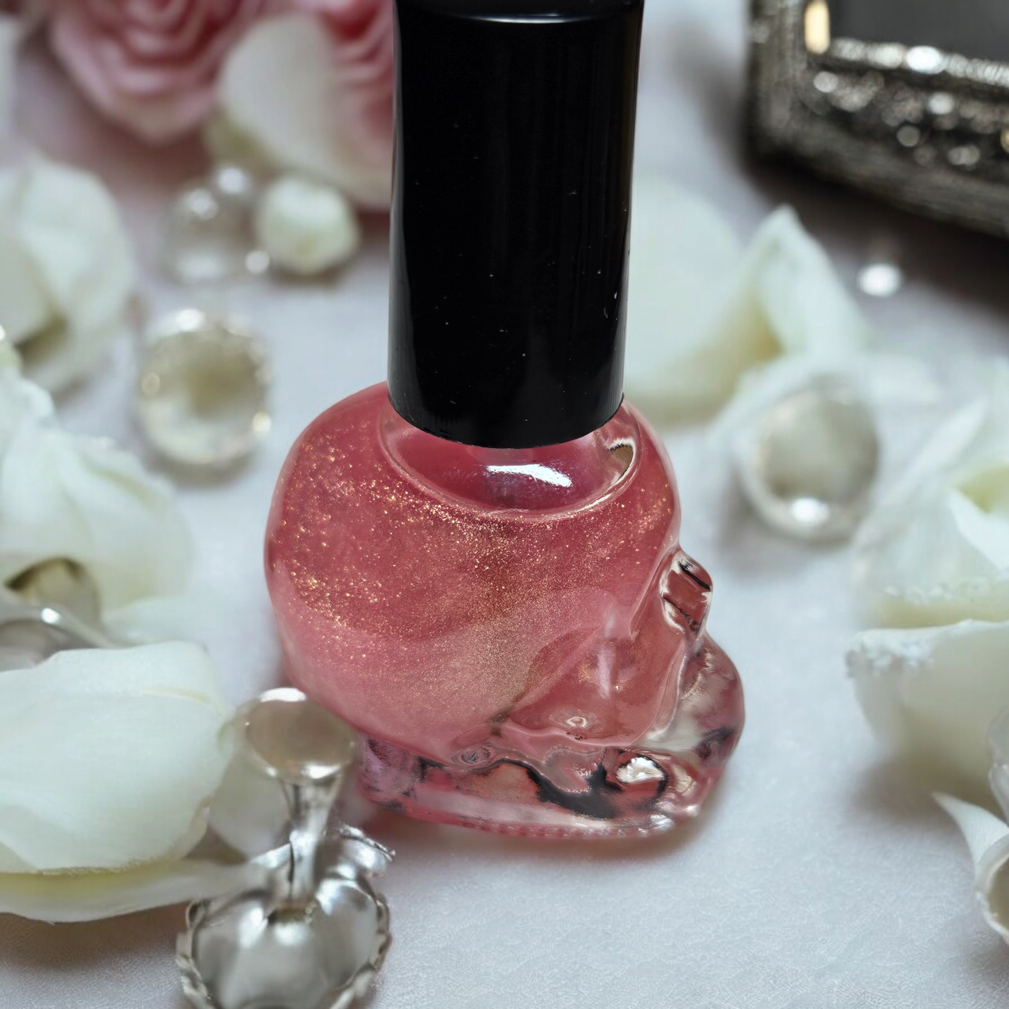 Skull Shaped Bottle with Rose scented cuticle oil.